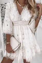 Vestido corto mini de encaje blanco